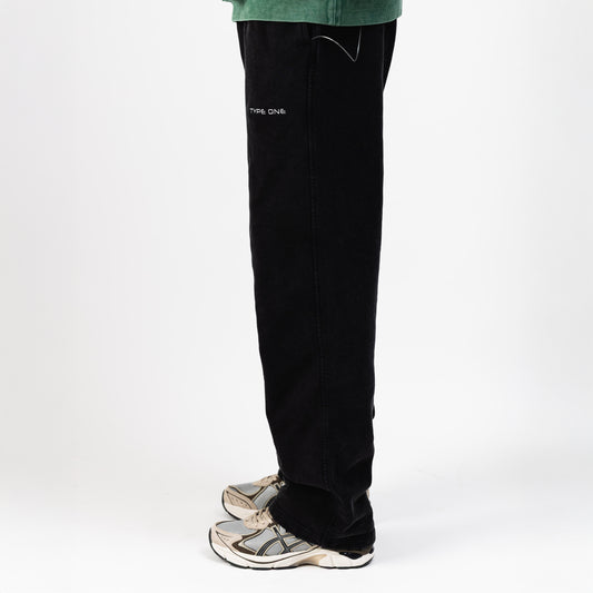 Sweatpants Black – on model side view | Washed distressed finish drawstring waist