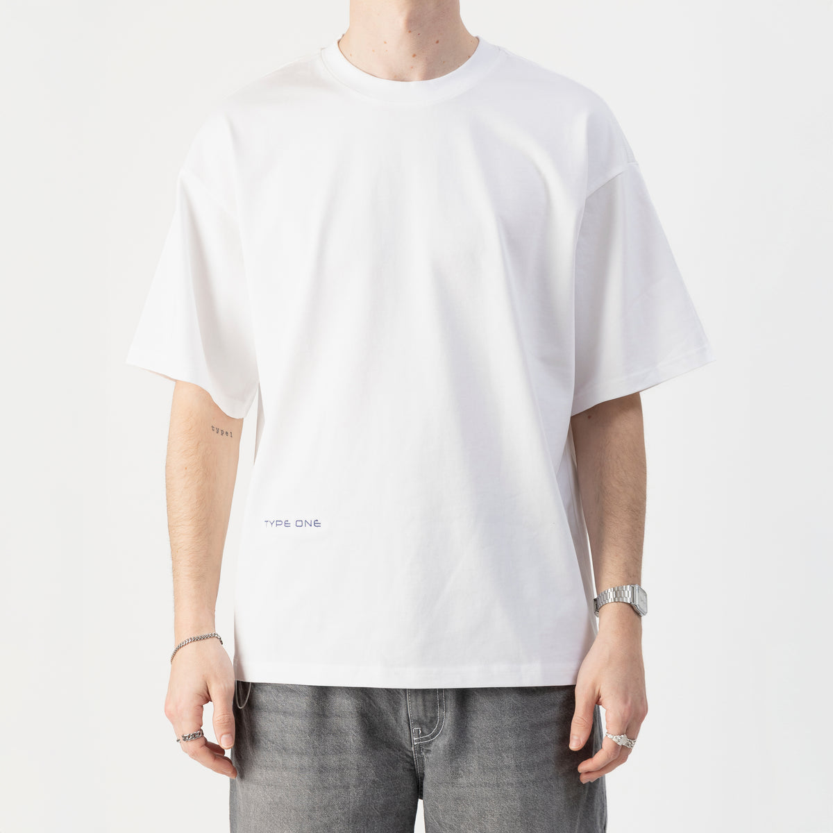 TOAL Tee White – On model front | Type One TOAL graphic tee